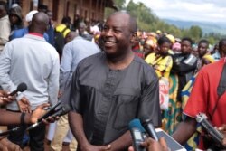 FILE - Evariste Ndayishimiye speaks to the media after voting during presidential and general elections at Bubu Primary school in Giheta, May 20, 2020.