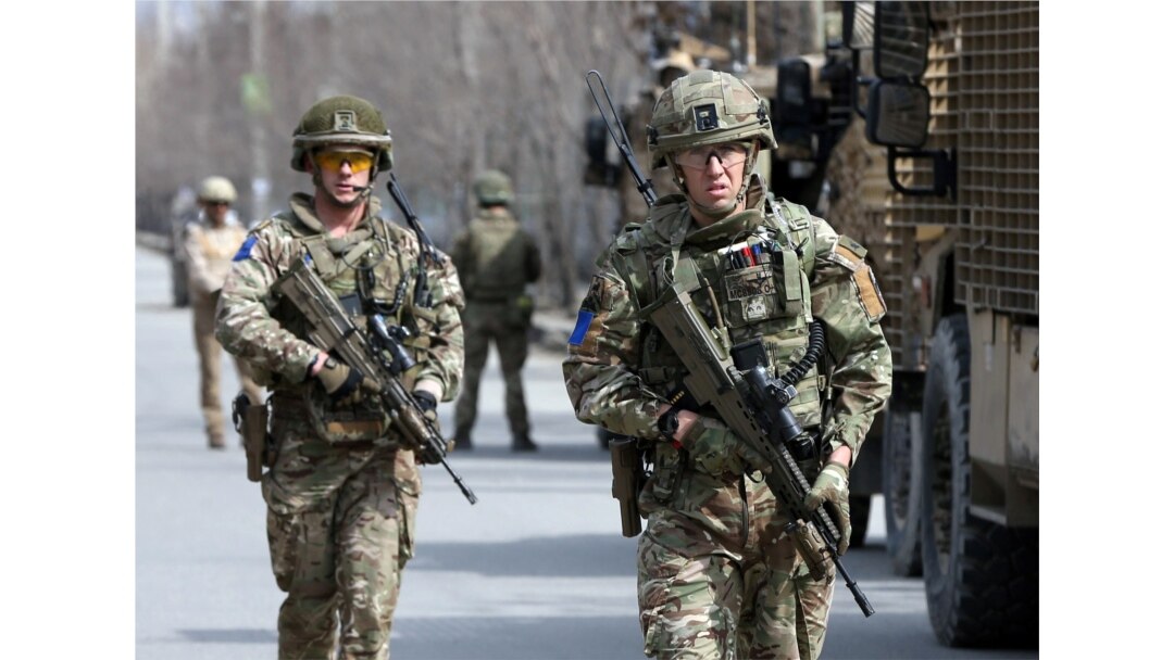 British soldiers with the NATO-led Resolute Support Mission arrive at the site of an attack in Kabul, Afghanistan, March 6, 2020.