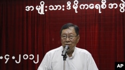 Top National League for Democracy (NLD) official Nyan Win talks to reporters after a meeting at the party's head office in Rangoon, April 20, 2012.