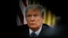 FILE - U.S. President Donald Trump looks on during a meeting with China's Vice Premier Liu He in the Oval Office at the White House in Washington, Feb. 22, 2019.