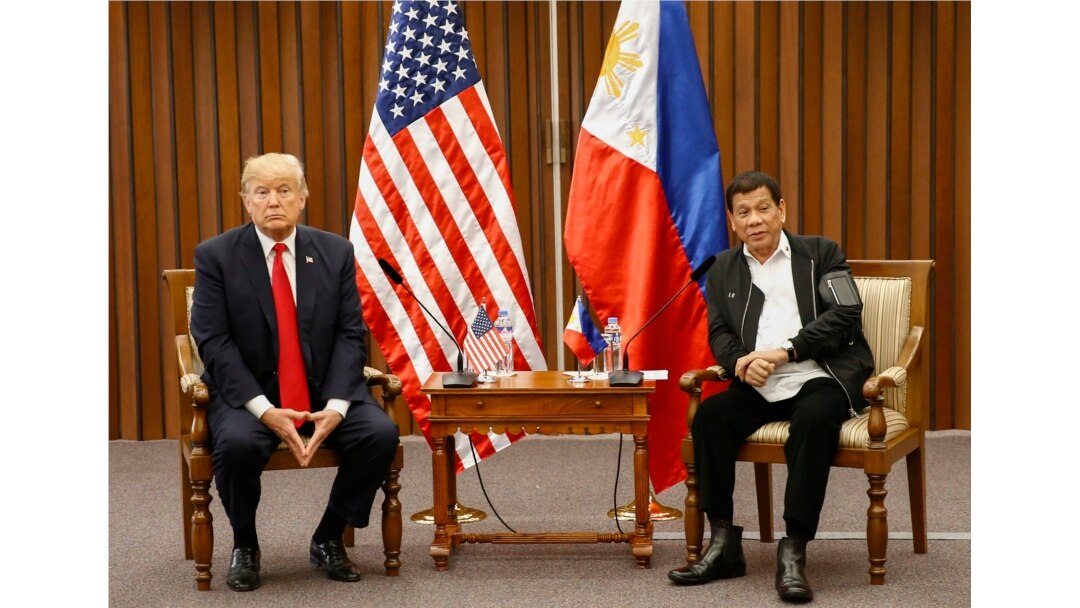 FILE - U.S. President Donald Trump, left, and Philippine President Rodrigo Duterte hold a bilateral meeting on the sidelines of an ASEAN Summit in Manila, Philippines, Nov. 13, 2017.