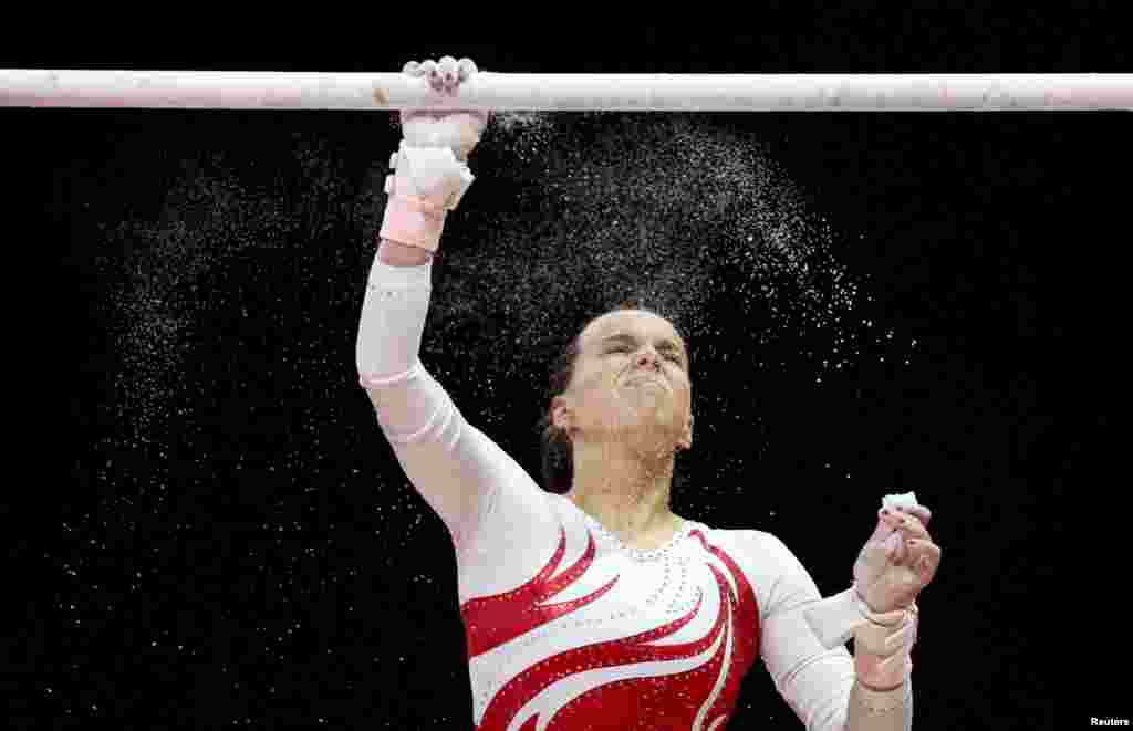 Anastasia Dubova of Latvia competes in the Artistic Gymnastics women's team qualification during 2018 European Championships in Glasgow, Britain.