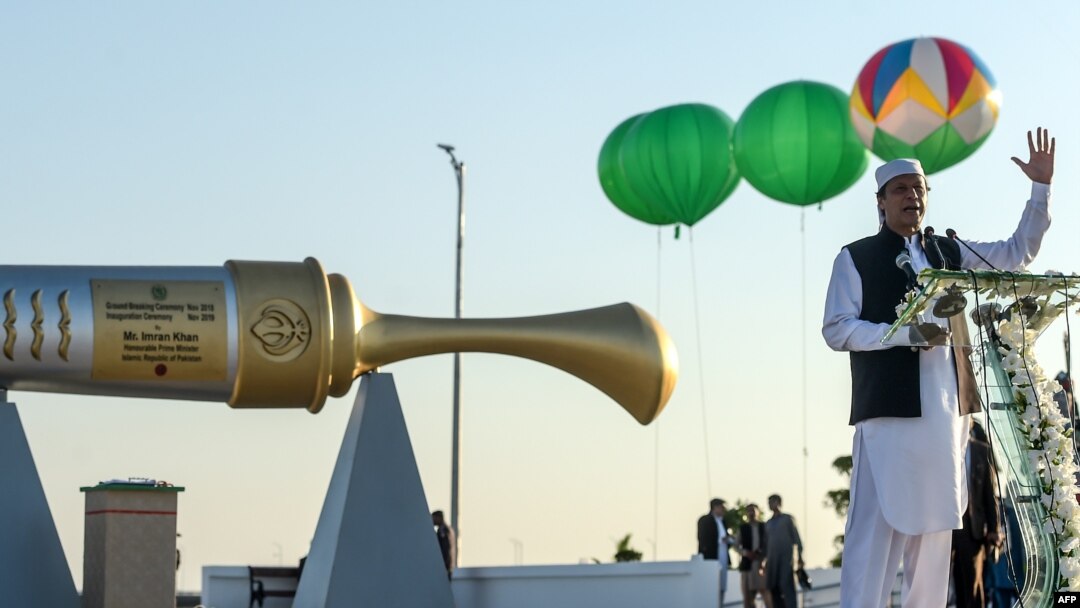 Pakistan's Prime Minister Imran Khan gestures as he speaks during the inauguration ceremony of the Gurdwara Darbar Sahib Kartarpur Corridor in Kartarpur, Pakistan, Nov. 9, 2019.