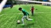 Kids play a pickup game of football in a central Moscow park. Russia hosts World Cup 2018 amid concerns its team may fair poorly. (C.Maynes for VOA)