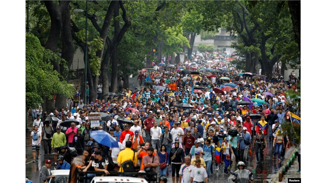Demonstrators rally against Venezuela's President Nicolas Maduro in Caracas, Venezuela, April 13, 2017.