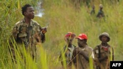 Basimba minduki na Tchei, Ituri, 28 juillet 2006