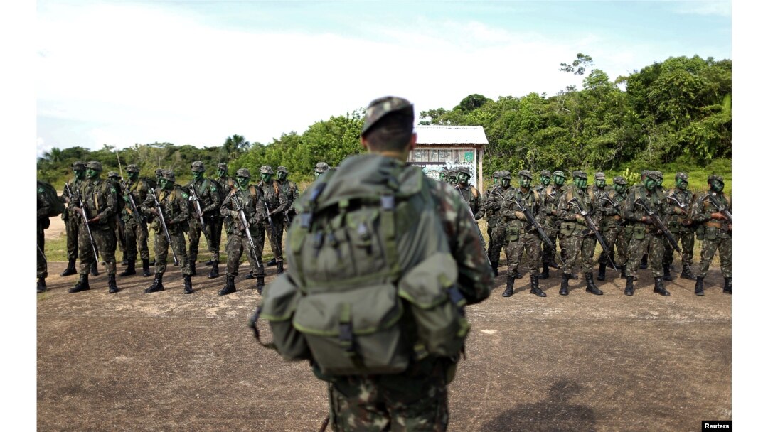 Brazilian Army soldiers are seen at the border with Colombia during a training to show efforts to step up security along borders, in Vila Bittencourt, Amazon State, Brazil, Jan. 18, 2017.