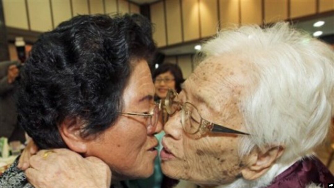 South Korean mother Kim Rye-jung, 96, right, kisses her North Korean daughter Woo Jung Hye during the Separated Family Reunion Meeting at Diamond Mountain in North Korea, 30 Oct 2010.