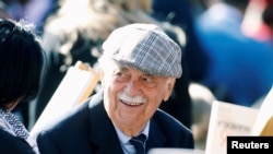 FILE - Human rights lawyer George Bizos arrives to hear Former U.S. President Barack Obama delivering the 16th Nelson Mandela annual lecture, marking the centenary of the anti-apartheid leader's birth, in Johannesburg, July 17, 2018. 