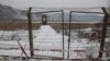 A gate is closed on a bridge over the Yalu River, on the Chinese side of the border with North Korea between the towns of Ji'an and Linjiang, China, Nov. 21, 2017. 