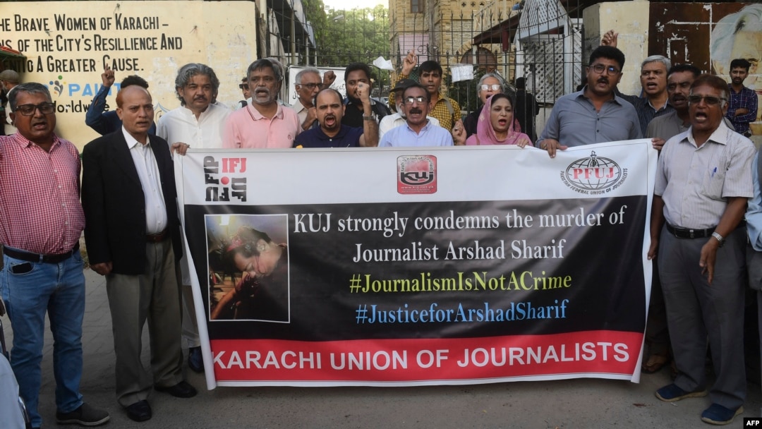 Media representatives shout slogans during a protest in Karachi on Oct. 24, 2022, against the killing of Pakistani news anchor Arshad Sharif in Kenya. 