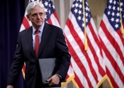 Attorney General Merrick Garland departs after speaking at the Justice Department in Washington, June 15, 2021.