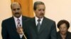 FILE - In this July 3, 2008 photo, Nawaf Fares, center, governor of the Quneitra, Syria, briefs a U.N. delegation visiting the city of Quneitra in the Golan Heights to investigate Israeli practices in occupied Arab lands.