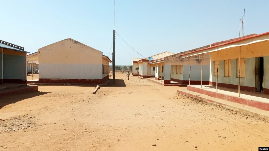 People walk at the Government Science secondary school in Kankara district, after it was attacked by armed bandits, in northwestern Katsina state, Nigeria, Dec. 12, 2020.