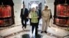 Field Marshal Hussein Tantawi walks with U.S. Secretary of State Hillary Clinton at the Ministry of Defense in Cairo, Egypt, July 15, 2012. 