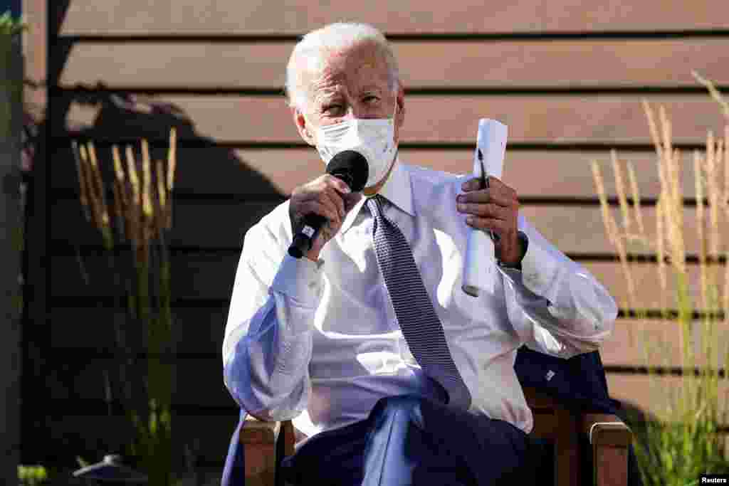 Joe Biden speaks about safely reopening schools amid the COVID-19 pandemic, in Wauwatosa, Wis., Sept. 3, 2020. The campaign stop was part of his trip to Wisconsin to discuss U.S. racial tensions in the wake of a Black man's shooting by police in Kenosha.