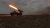 Військовослужбовці ЗСУ стріляють із РСЗВ БМ-21 "Град" по російським позиціям на Харківщині,15 травня 2024. Фото AFP