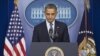 President Barack Obama pauses as he talks about the Connecticut elementary school shooting, in the White House briefing room in Washington, December 14, 2012.