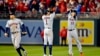 Los Astros Correa (1) y Reddick (22) celebran después de ganar en el 3er juego de la Serie Mundial a los Nats en el Nationals Park, de Washington D.C. el 25 de octubre de 2019. Reuters.