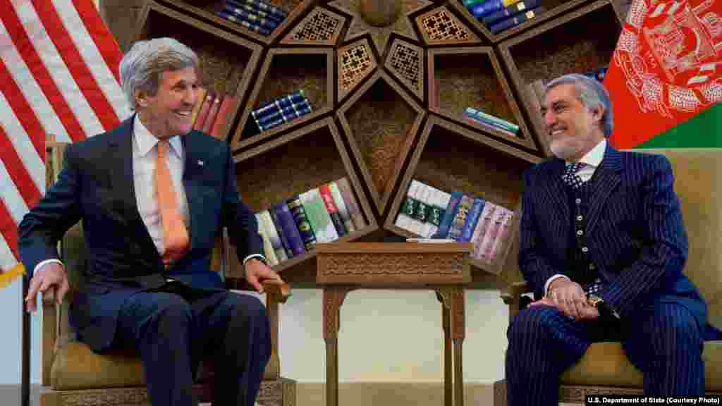 U.S. Secretary of State John Kerry, left, shares a laugh with Afghanistan CEO Abdullah Abdullah before meeting at the Sepidar Palace in Kabul, Afghanistan, April 9, 2016.