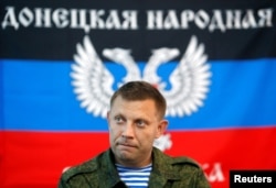 FILE - Prime Minister of the self-proclaimed Donetsk People's Republic Alexander Zakharchenko attends a news conference in Donetsk, Ukraine, Aug. 11, 2014.