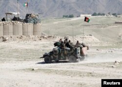 Afghan special forces patrol in Pandola village near the site of a U.S. bombing in the Achin district of Nangarhar province in eastern Afghanistan April 14, 2017.
