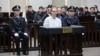 谢伦伯格被带进法庭。(2019年1月15日)