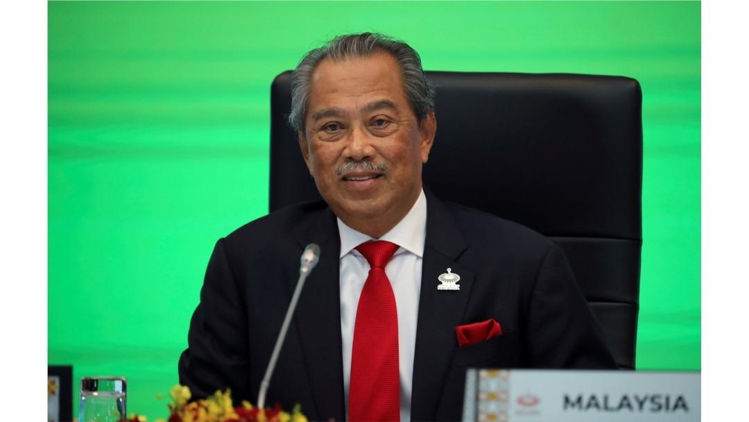 FILE PHOTO: Malaysia's Prime Minister Muhyiddin Yassin speaks during opening remarks for virtual APEC Economic Leaders Meeting 2020, in Kuala Lumpur, Malaysia, Nov. 20, 2020.
