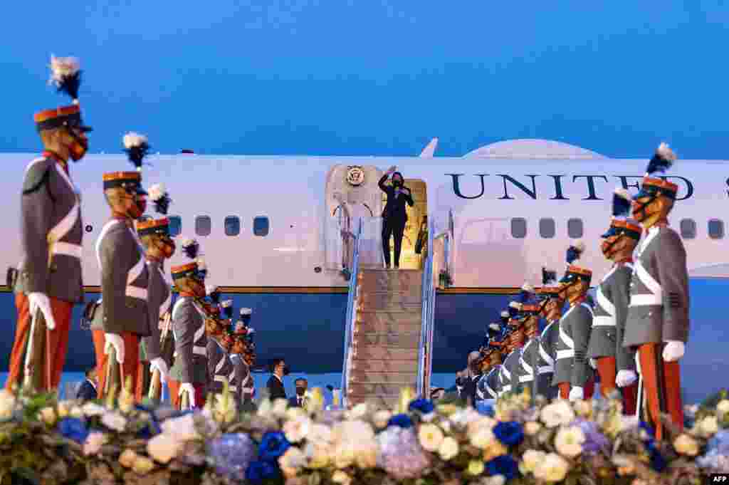 U.S. Vice President Kamala Harris waves upon arrival at the Aeropuerto Internacional La Aurora in Guatemala City, June 6, 2021.