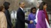President Barack Obama, is greeted by Rev. Luis Leon, as he and his family arrive at St. John's Church in Washington, Jan. 21, 2013.
