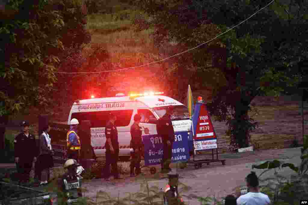 An ambulance leaves the Tham Luang cave area after divers evacuated some of the 12 boys and their coach trapped at the cave in Khun Nam Nang Non Forest Park in the Mae Sai district of Chiang Rai province. Elite divers began the extremely dangerous operation to extract 12 boys and their football coach who have been trapped in a flooded cave complex in northern Thailand for more than two weeks, as looming monsoon rains threatened the rescue effort.
