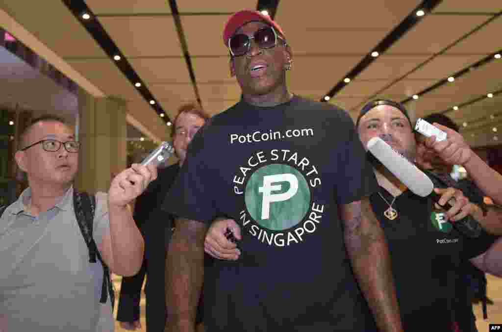 Retired American professional basketball player Dennis Rodman speaks to the press as he arrives at Changi International airport ahead of U.S.-North Korea summit in Singapore. North Korea's Kim Jong Un and U.S. President Donald Trump meet on June 12 for an unprecedented summit in an attempt to address the last festering legacy of the Cold War, with the U.S. President calling it a "one time shot" at peace.
