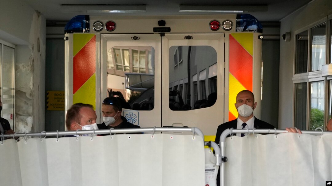 An ambulance carrying Czech President Milos Zeman arrives at the Military Hospital in Prague, Czech Republic, Oct. 10, 2021. 