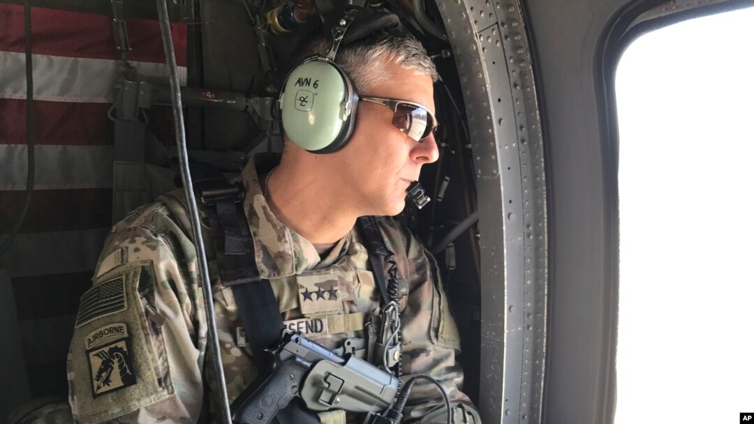 FILE - Then-Lt. Gen. Stephen Townsend surveys the scene during a tour north of Baghdad, Iraq. Feb. 8, 2017. Townsend, now a general and head of U.S. forces in Africa, says a secure Africa "remains an enduring American interest."
