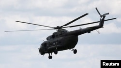 A Russian-made MI-17 helicopter of the Colombian army is seen flying in Meta, Colombia Jan. 14, 2018.