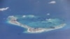 美两艘驱逐舰抵近有争议美济礁“自由航行”，国防部做出说明