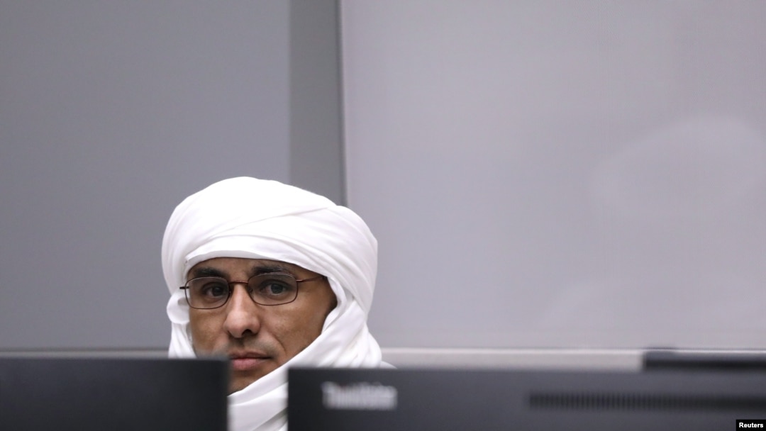 FILE - Malian Islamist militant Al Hassan Ag Abdoul Aziz Ag Mohamed Ag Mahmoud sits in the courtroom of the International Criminal Court during his trial at the Hague, the Netherlands, July 8, 2019. 