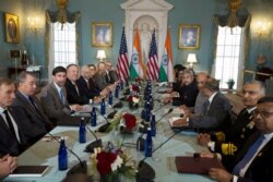 Secretary of State Mike Pompeo and Secretary of Defense Mark Esper, center left, host Indian External Affairs Minister Dr. S. Jaishankar and Defense Minister Rajnath Singh, center right, at the Department of State in Washington, Dec. 18, 2019.