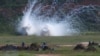 Chinese and Russian soldiers take part in a joint military drill in Zhanjiang, Guangdong province, China, Sept. 14, 2016. 