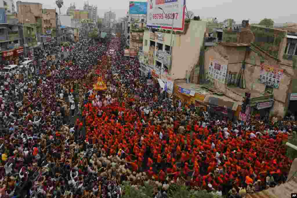 Hindu devotees participate in the annual festival of Rath Yatra, or chariot procession, in Ahmadabad, India.