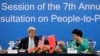 U.S. Secretary of State John Kerry, left, holds the hand of Chinese Vice Premier Liu Yandong after delivering a speech for the plenary session of the 7th annual U.S.-China High-Level Consultation on People-to-People Exchange at the National Museum in Beijing, June 7, 2016.