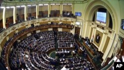 FILE - Members of Egypt's Parliament attend the inaugural session in Cairo, Jan. 10, 2016. 