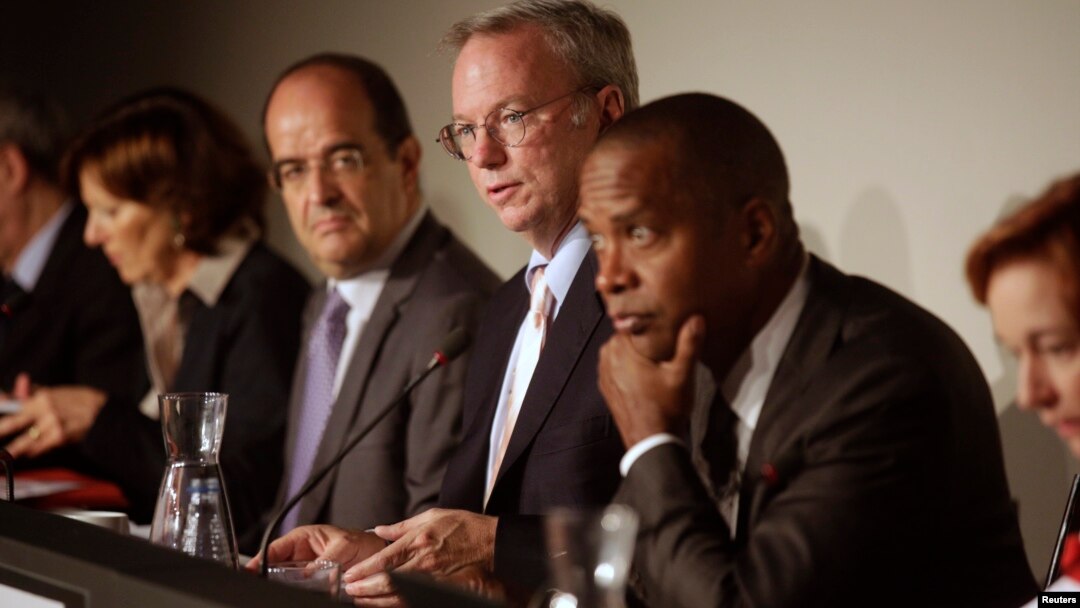 Google Executive Chairman Eric Schmidt, center, joins panelists hearing privacy and public information concerns in Madrid Sept. 9, 2014.