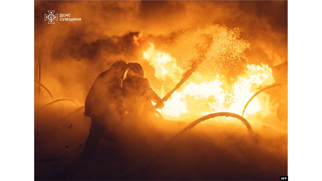 This handout photograph taken and released by Ukrainian State Emergency Service on Feb. 2, 2025, shows firefighters putting out a fire in the Eastern Ukraine Sumy region following a Russian strike.