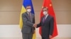 Міністр закордонних справ України Дмитро Кулеба під час зустрічі із главою МЗС Китаю Ванг Ї у вересні 2022 року. Фото: Li Rui/Xinhua via AP 