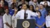 President Barack Obama gestures as he speaks to workers about the economy during a visit to Daimler Detroit Diesel in Redford, Michigan, December 10, 2012.