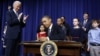 U.S. President Barack Obama signs executive orders on gun violence during an event at the White House in Washington, January 16, 2013. 
