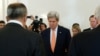 Russian Foreign Minister Sergei Lavrov (L) and U.S. Secretary of State John Kerry (C) observe a moment of silence for the attack victims of Nice during a meeting in Moscow, Russia, July 15, 2016.