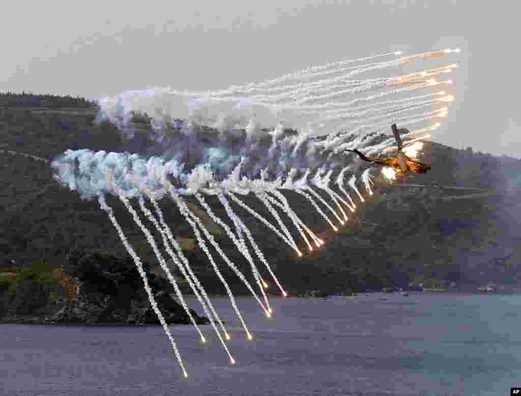 A Turkish Army helicopter takes part in the EFES 2018 drills in Seferihisar in Aegean Sea near Izmir, Turkey.