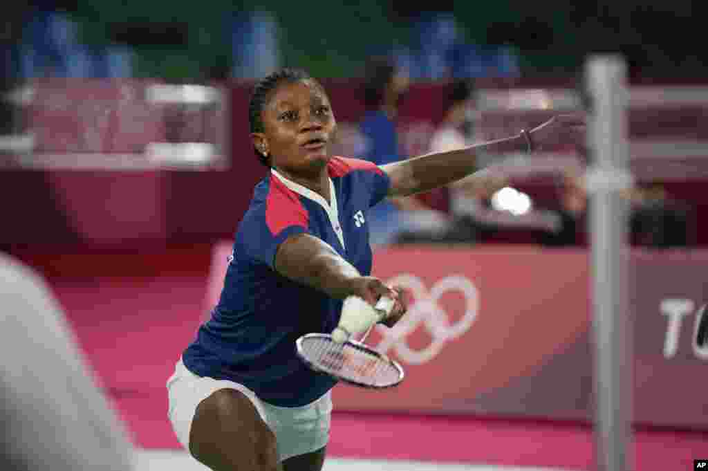 Nigeria's Dorcas Ajoke Esojkan Adesokan plays against Seyoung An of South Korea during women's singles group play stage Badminton match at the 2020 Summer Olympics, Tuesday, July 27, 2021, in Tokyo, Japan. (AP Photo/Dita Alangkara)